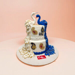 Peacock theme wedding cake,wedding cakes, anniversary cake, happy anniversary cake, bride to be cake, bridal shower cake, marriage anniversary cake, Wedding cakes online, 2 tier wedding cake, Order beautiful happy anniversary cake, Order wedding cakes online, 4 tier wedding cakes, simple wedding cakes for small wedding, happy marriage cake, rose wedding cake, wedding anniversary cake for parents, cake for bride, white chocolate wedding cake, 50 years anniversary cake, wedding anniversary special cake, theme wedding cake cake square