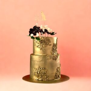 Signature Gold Wedding Cake, Luxury wedding cake, Designer gold wedding cake, Elegant gold wedding cake, Custom wedding cakes in Chennai, Order wedding cakes online, Premium wedding cakes, Gold theme wedding cake, Wedding cakes near me, Best wedding cake shop in Chennai, Two-tier wedding cake with gold, 4 tier gold wedding cake, Golden anniversary wedding cake, Wedding cake for reception, Wedding cake designs in gold, Customised gold wedding cakes, Royal gold wedding cake, Gold floral wedding cake design, Best designer cakes for weddings Chennai, Online wedding cake delivery Chennai, Themed wedding cakes in Chennai, Signature wedding cakes, Gold and cream wedding cake, Cake Square