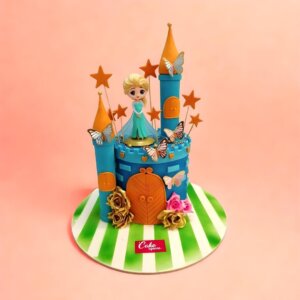 Colourful castle cake with Elsa figure, butterflies, and flowers in Chennai.