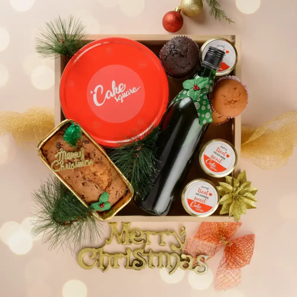 Christmas Gift Hamper Box with Homemade Wine & 800g Cake Homemade wine, 800 gms plum cake gift tin, Half kg dates and walnut cake, Cookies, Muffins, Chocolates, Macaroons