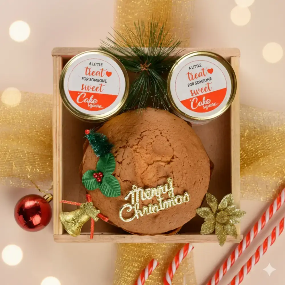 Cute Christmas Tea Cake Gift Combo @499 Tea cake 250 gms, Macaroons 100 gms, Chocolates, Vanilla and chocolate muffin