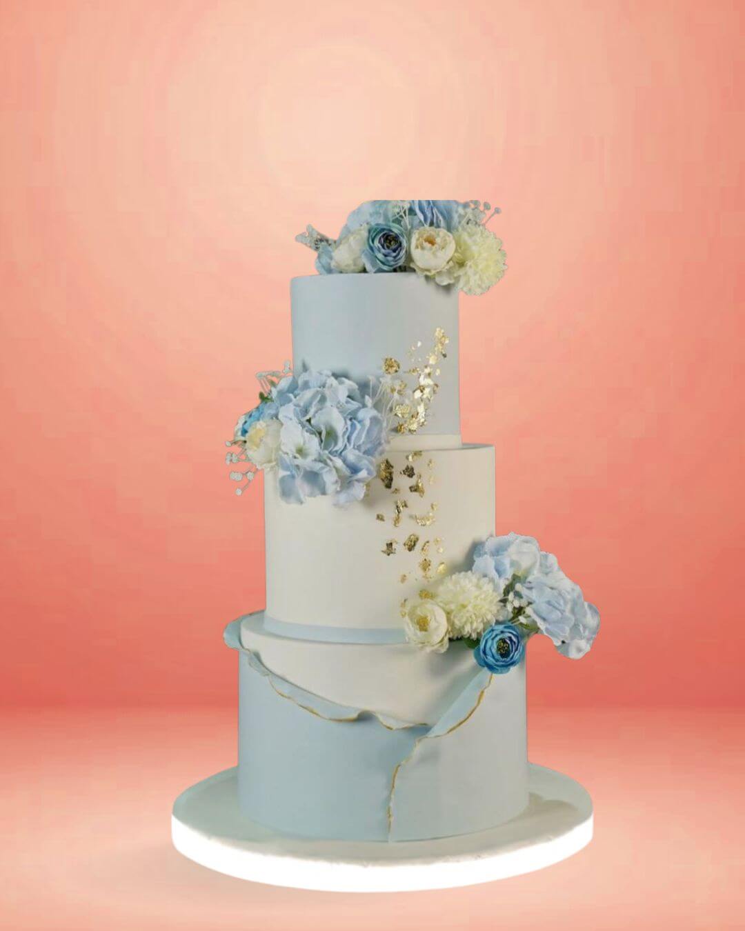 eternal elegance custom wedding cakes, cakes design, wedding cake design, customised weddingcakes, ivory wedding cake, floral wedding, light blue cake, premium wedding cake, white with blue theme cake