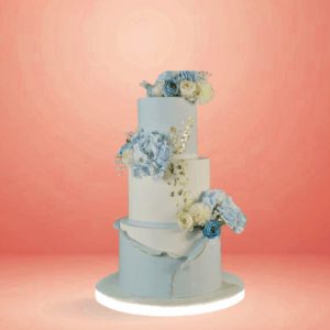 eternal elegance custom wedding cakes, cakes design, wedding cake design, customised weddingcakes, ivory wedding cake, floral wedding, light blue cake, premium wedding cake, white with blue theme cake