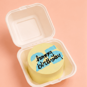 A colourful birthday cake in a white box with "happy birthday" decoration, Chennai. aesthetic birthday bento cake, aesthetic bento cake, birthday bento cake, korean bento cake, minimalist bento cake, cute bento cake, personalized bento cake, custom bento cake, korean cake chennai, aesthetic cake chennai, mini birthday cake, trendy bento cake, instagram bento cake, birthday cake for her, birthday cake for him, aesthetic birthday cake, cute birthday cake, bento cake delivery chennai, same day bento cake delivery chennai, customized birthday cake chennai, premium bento cake, best bento cakes in chennai, best aesthetic cakes in chennai, cake square, cake square bento cake, birthday surprise cake, korean minimalist cake, elegant birthday cake, custom birthday cake chennai, aesthetic cake delivery chennai