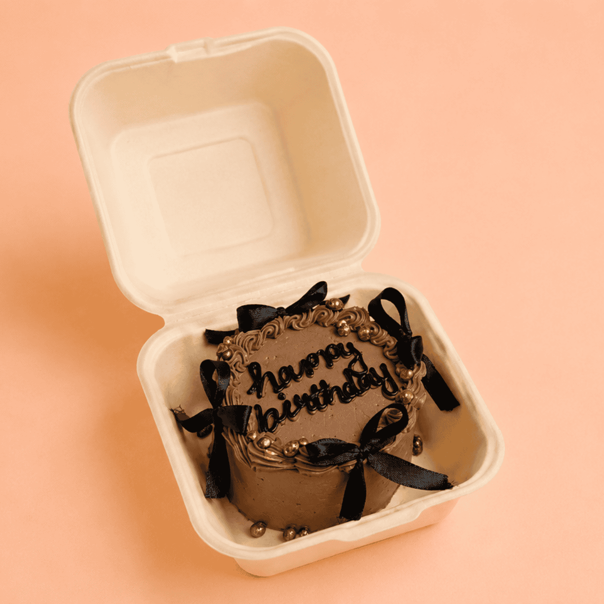 Chocolate birthday cake with black ribbons in a box, Chennai celebration. birthday bento cake, happy birthday bento cake, korean birthday bento cake, korean bento cake, personalized birthday bento cake, custom bento cake, mini birthday cake, cute birthday cake, aesthetic birthday cake, minimalist birthday cake, trendy bento cake, instagram bento cake, birthday cake for him, birthday cake for her, cake for husband, cake for wife, birthday cake for boyfriend, birthday cake for girlfriend, customized birthday cake chennai, bento cake delivery chennai, same day bento cake delivery chennai, birthday cake delivery chennai, korean cake chennai, premium bento cake chennai, best bento cakes in chennai, best birthday cake in chennai, customized cake chennai, cake square, cake square bento cake, birthday surprise cake, small birthday cake, cute korean cake, personalised cake chennai, birthday bento cakes with cute ribbon