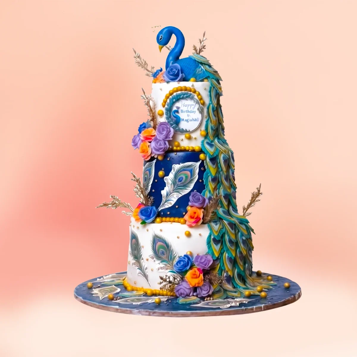 Three tier royal peacock birthday cake in Chennai with a blue peacock figure, a cascade of fondant feathers, white and navy tiers and sugar roses from Cake Square.