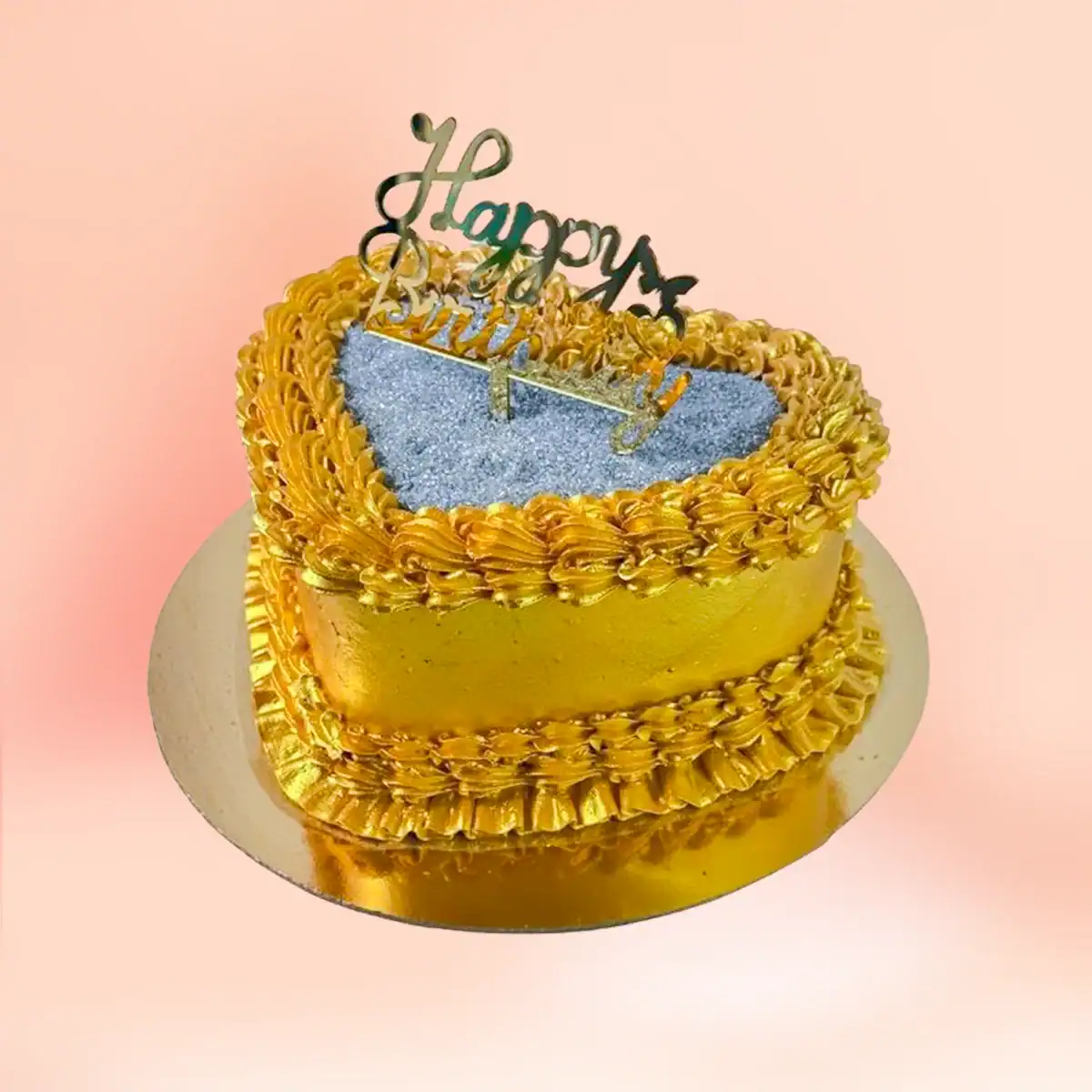 Gold heart shaped glitter birthday cake in Chennai with hand piped gold buttercream shell borders, a silver glitter centre panel and a Happy Birthday topper from Cake Square.