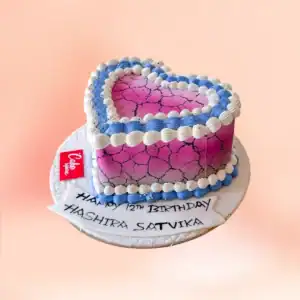Marble effect heart shaped buttercream cake in Chennai with a magenta crackle finish, blue and white shell piping and a custom message plaque from Cake Square.