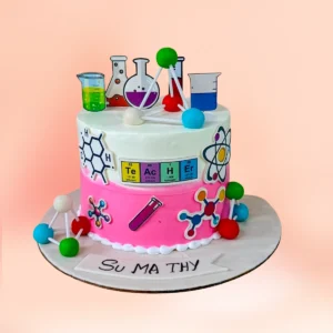 Chemistry and science theme birthday cake in Chennai with fondant beakers, a flask, a hanging molecule model and periodic table detailing from Cake Square.